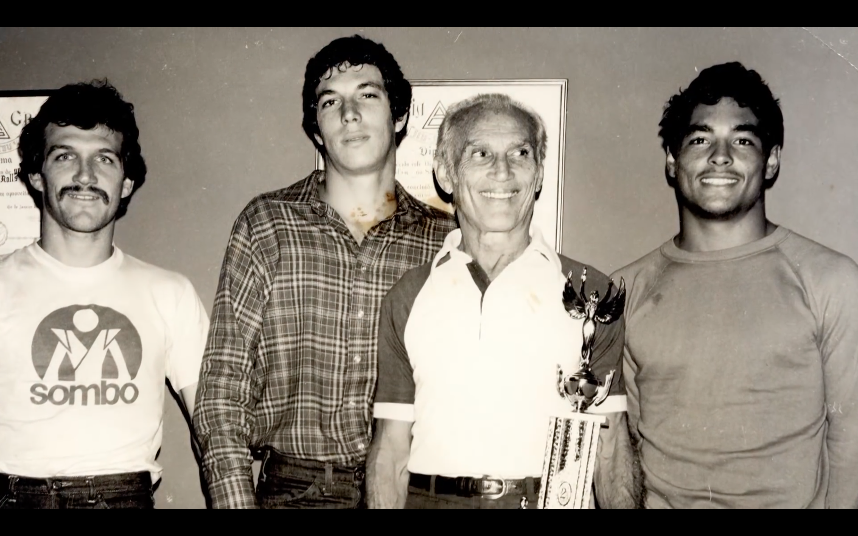 Rolls Gracie with trophy — with Hélio